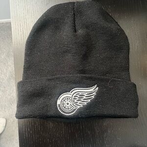 New Era Black Beanie with White Logo